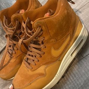 Tan brown Nike high top shoes